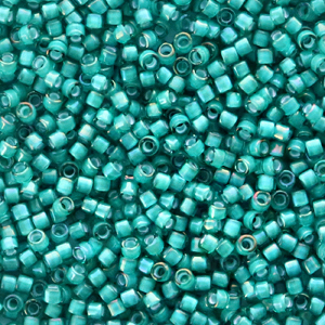 Miyuki kralen 11/0 delica's White lined teal AB DB-1782