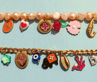 Nieuwe bedels van stainless steel met enamel