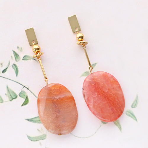 Sieraden met half edelsteen kralen in warme kleuren