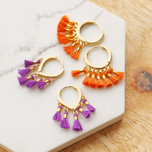 Verwerk de mini kwastjes in vrolijke sieraden