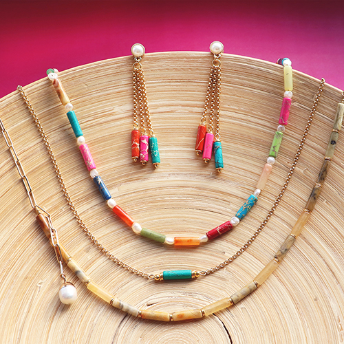 Ontwerp kettingen en oorbellen met natuursteen kralen