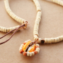 DIY: sieraden maken met kauri schelpjes