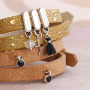 Maak een trendy armbanden collectie met Cuoio schuivers en cabochons